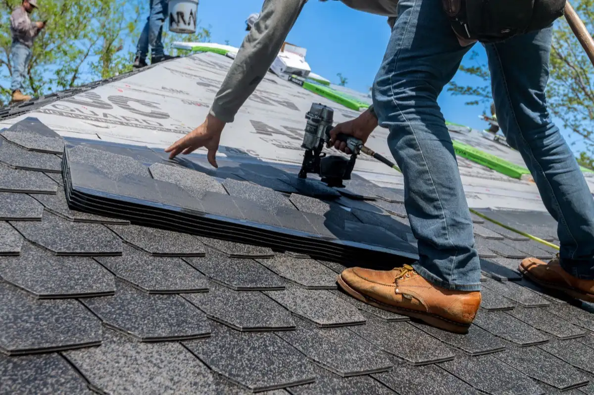 Inspecting an asphalt shingle slope after a hailstorm in Marana, AZ
